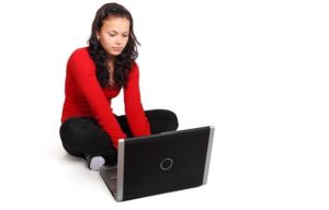 woman sitting and working
