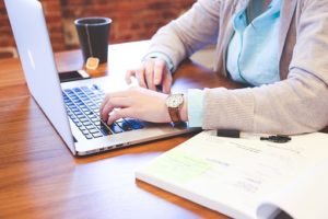 typing on laptop
